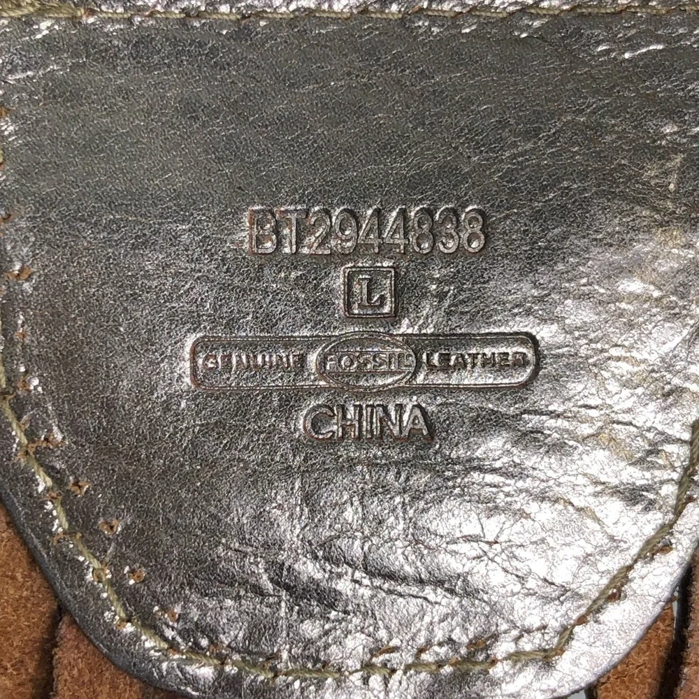 Fossil leather, metallic woven belt